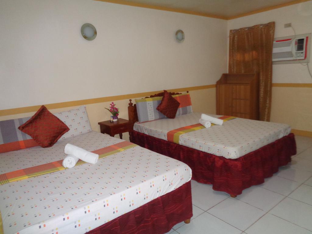 D'Lucky Garden Inn & Suites Tiniguiban Екстериор снимка