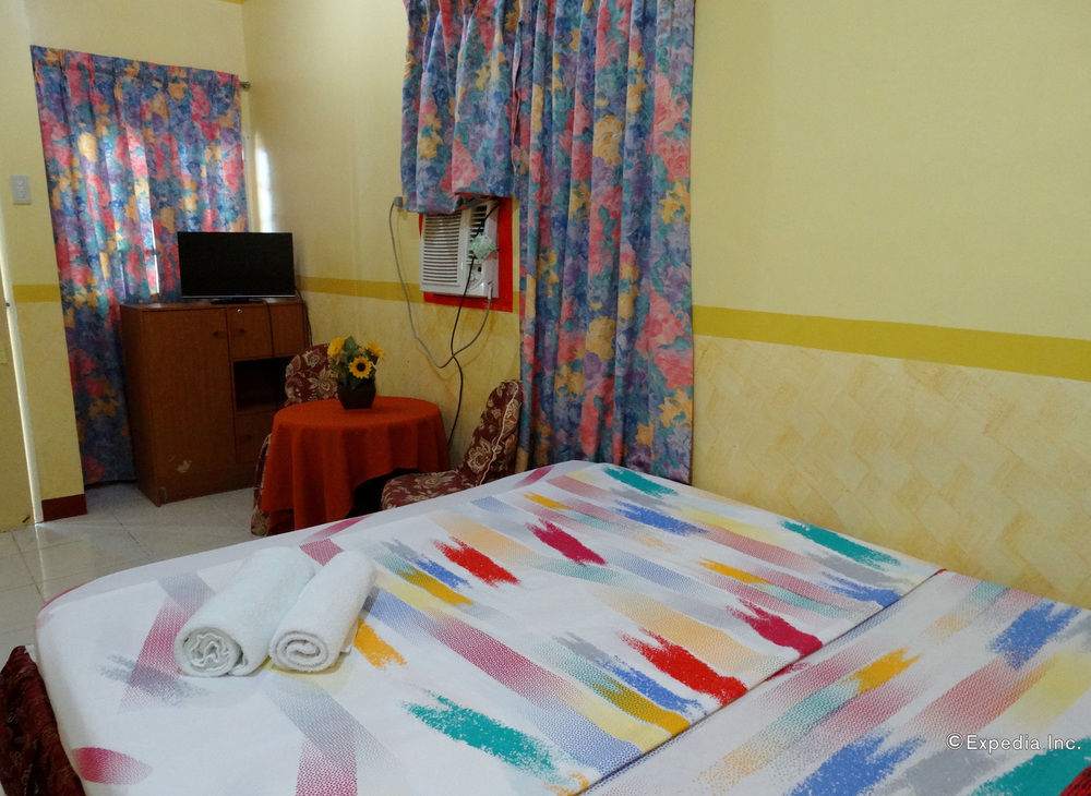 D'Lucky Garden Inn & Suites Tiniguiban Екстериор снимка