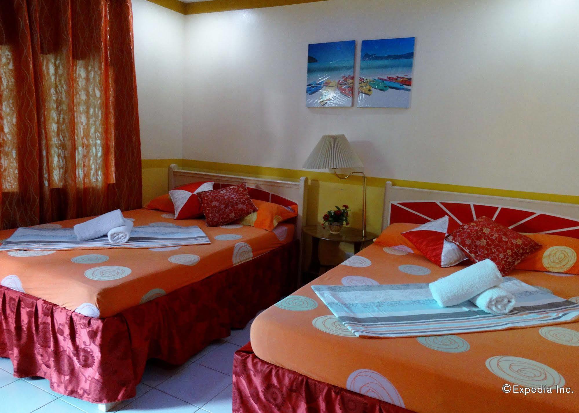 D'Lucky Garden Inn & Suites Tiniguiban Екстериор снимка
