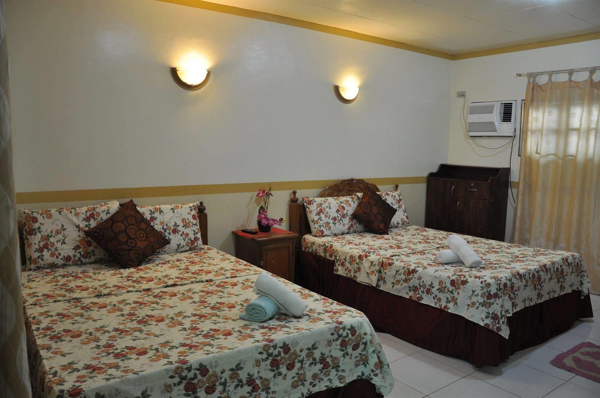 D'Lucky Garden Inn & Suites Tiniguiban Екстериор снимка